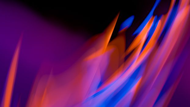 Colorful abstract light streaks with neon glow in vibrant hues of orange and blue.