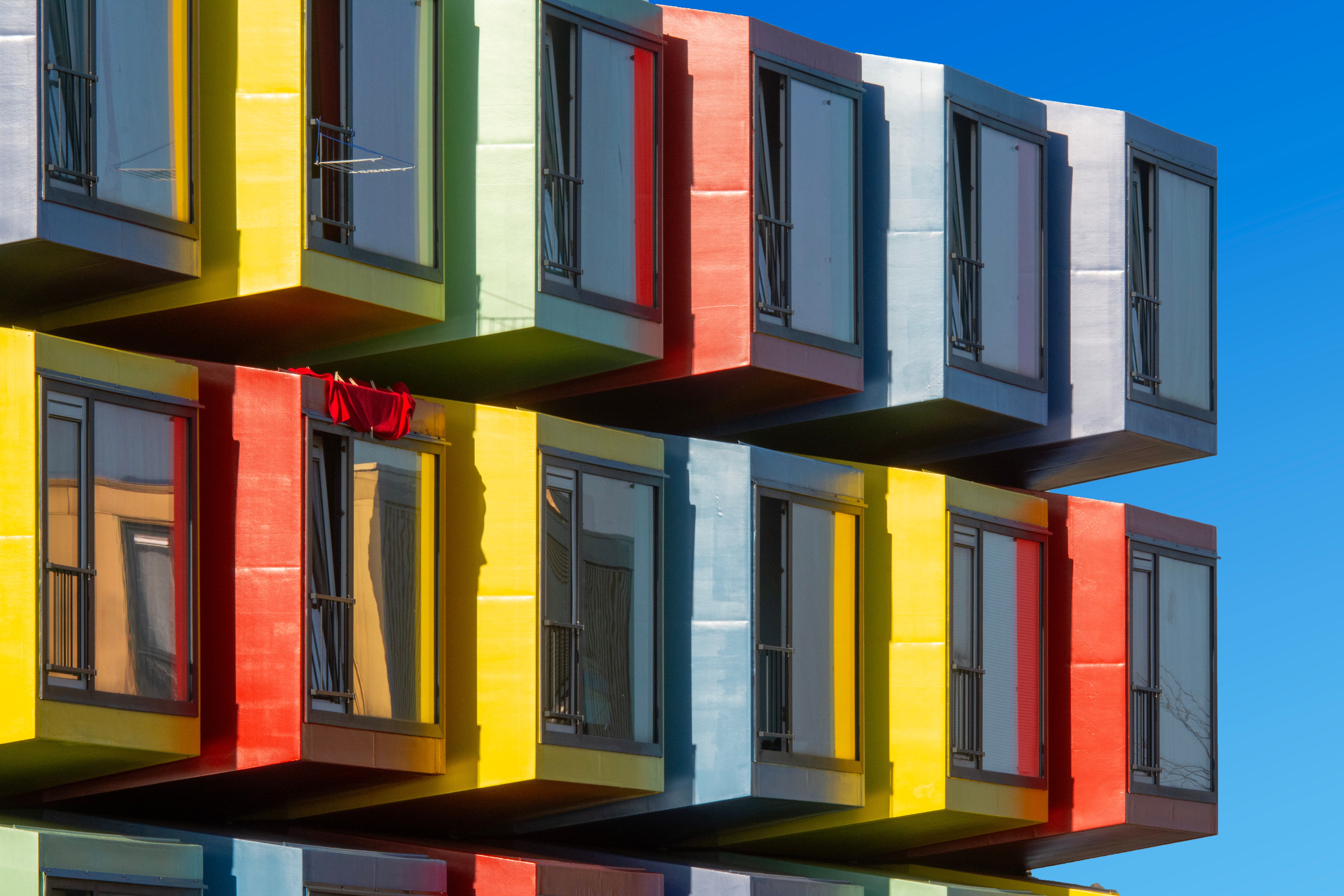 Modern colorful building blocks representing the modular structure of AI content drafting for blogs.