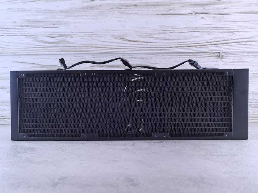 Detail einer abnehmbaren Heizkörperfront mit Magnetbefestigung und Metallgitter