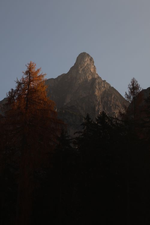 Free A stunning view of Dolomite peaks at sunset in Trentino-South Tyrol, Italy. Stock Photo