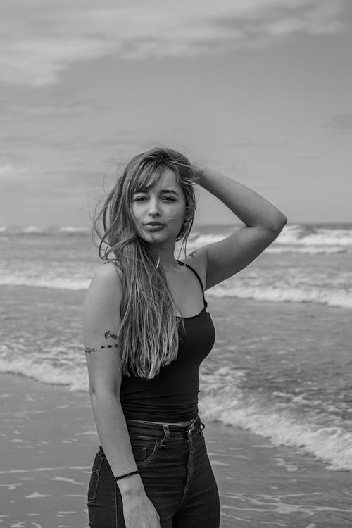 Grayscale Photography of Woman Wearing Spaghetti Strap Top