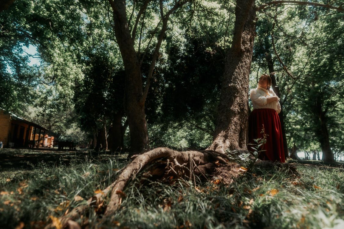 Rustic Scene with Traditional Dress in Forest · Free Stock Photo