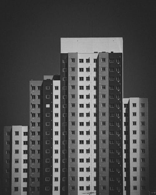 Grayscale Photo of High-rise Buildings