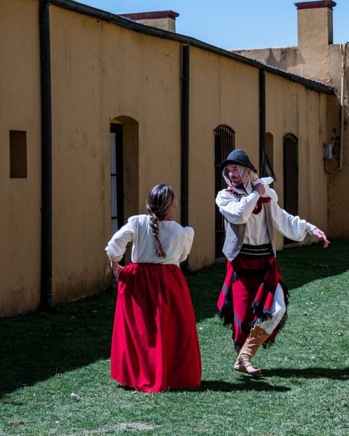 Free Gauchos in traditional attire dancing in Chascomús, Argentina's countryside. Stock Photo
