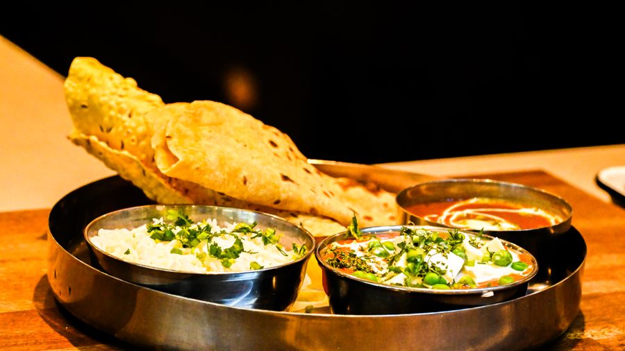 Home catering vegetarian thali and Indian meal spread for Baner Pune families
