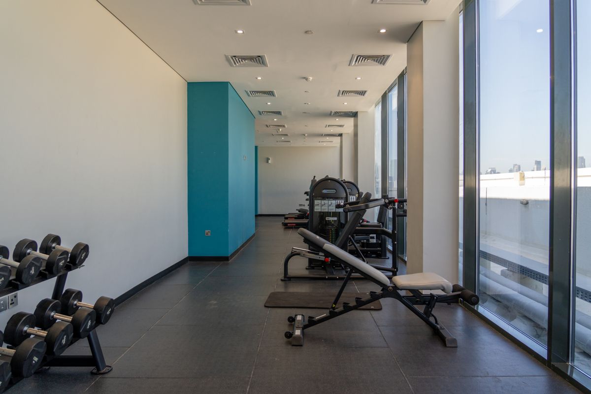 Modern gym interior with strength training machines