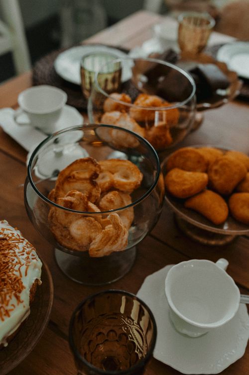 Free Elegant table setup with various pastries and coffee cups, perfect for gatherings. Stock Photo