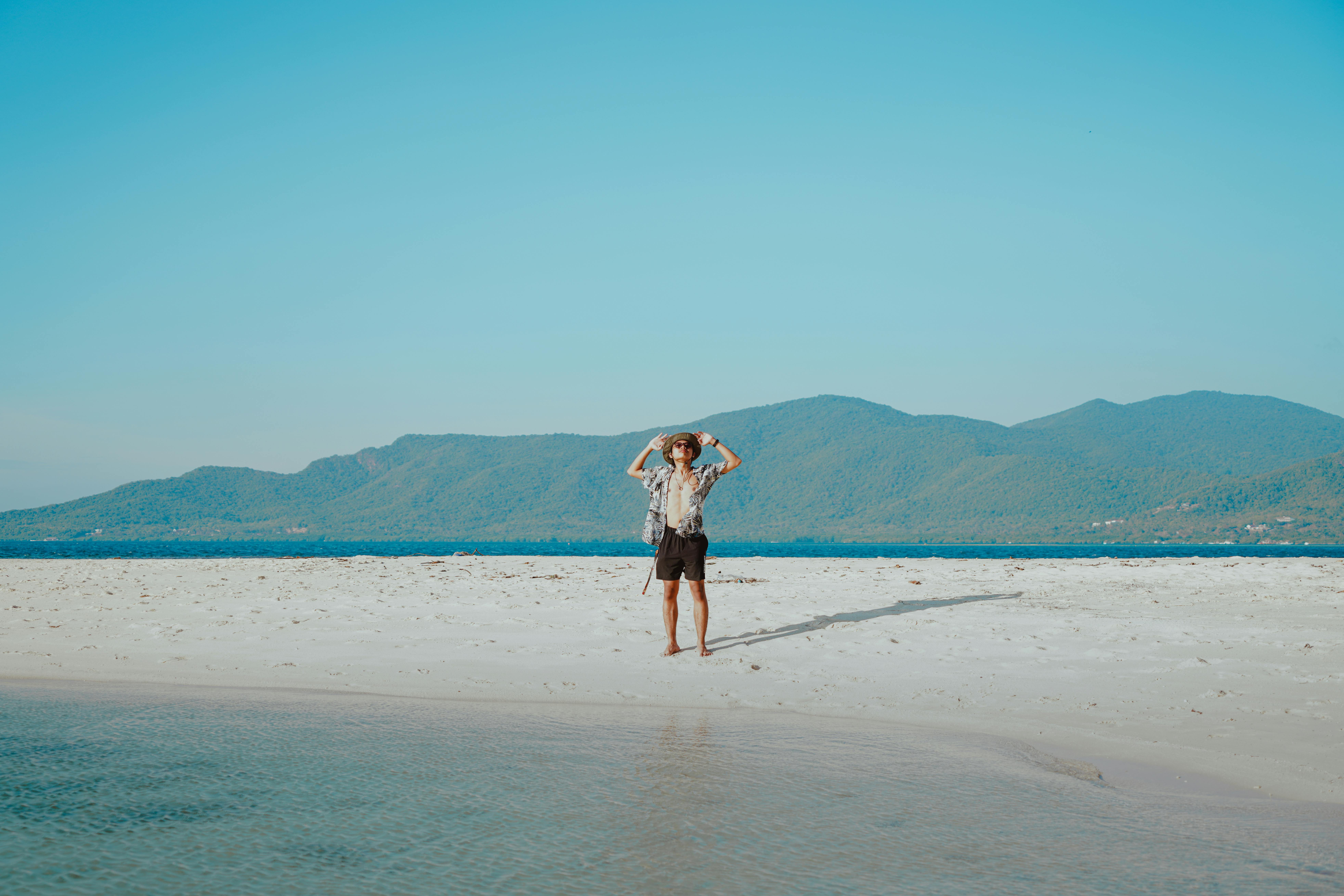 The only country in the world without a rectangular flag, known for its unique shape. Where am I?