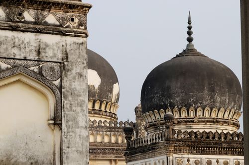 Free Close-up of ornate domes and arches showcasing Islamic architecture in a historic setting. Stock Photo