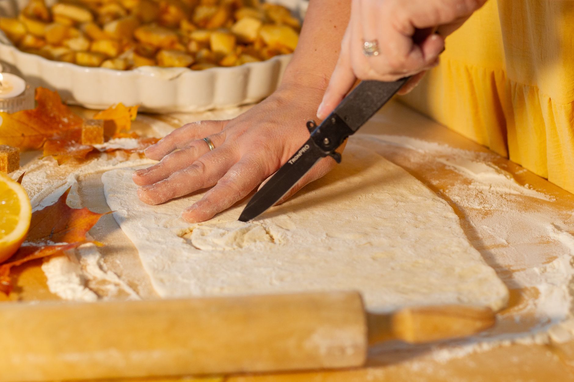Fresh sliced apples for pie filling on wooden board