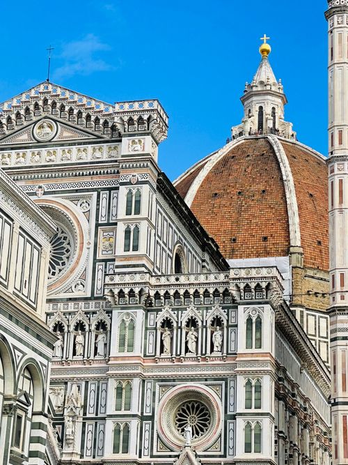 Free Close-up of the Florence Cathedral's dome and facade, highlighting architectural details. Stock Photo