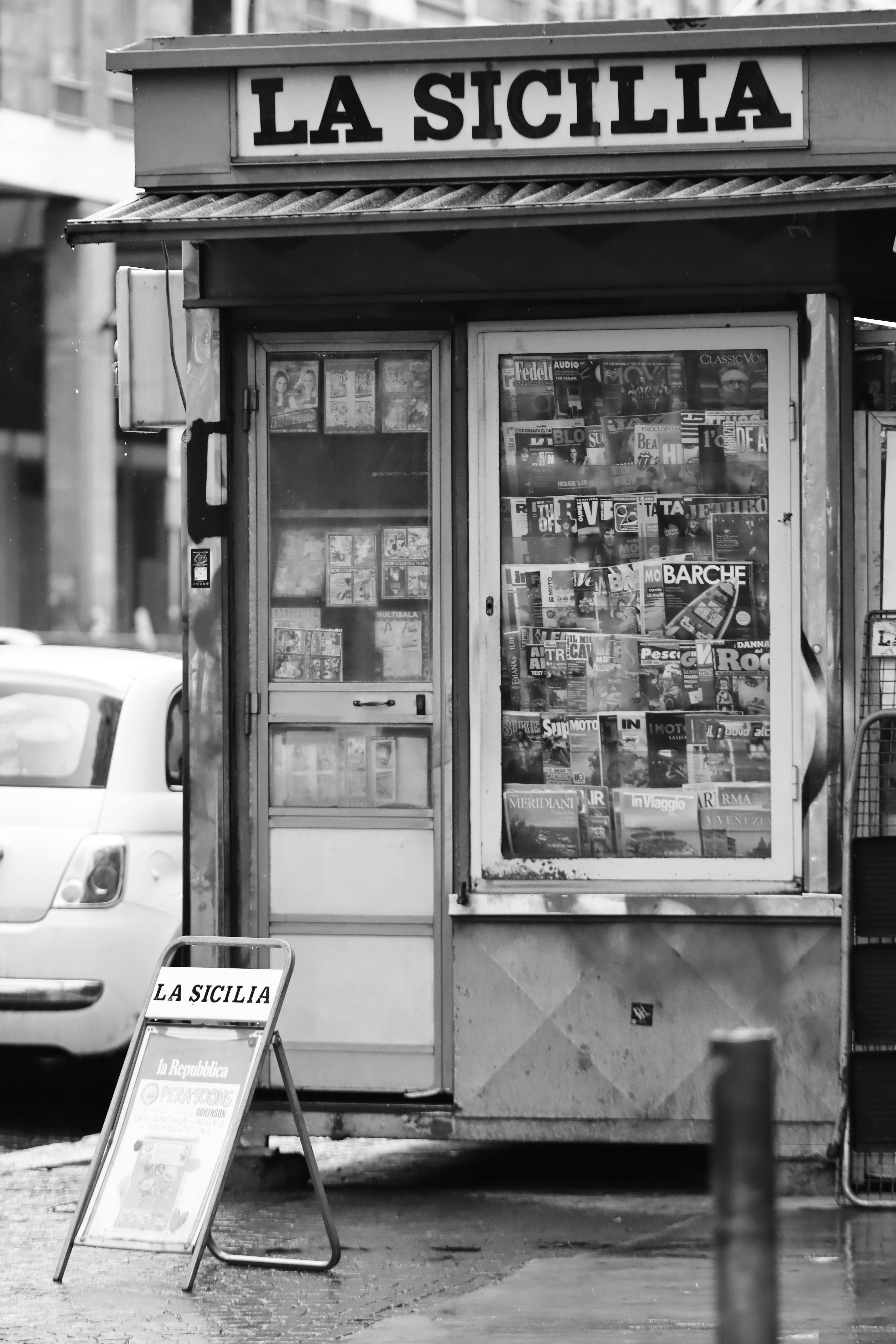 street newsstand in catania s black and white