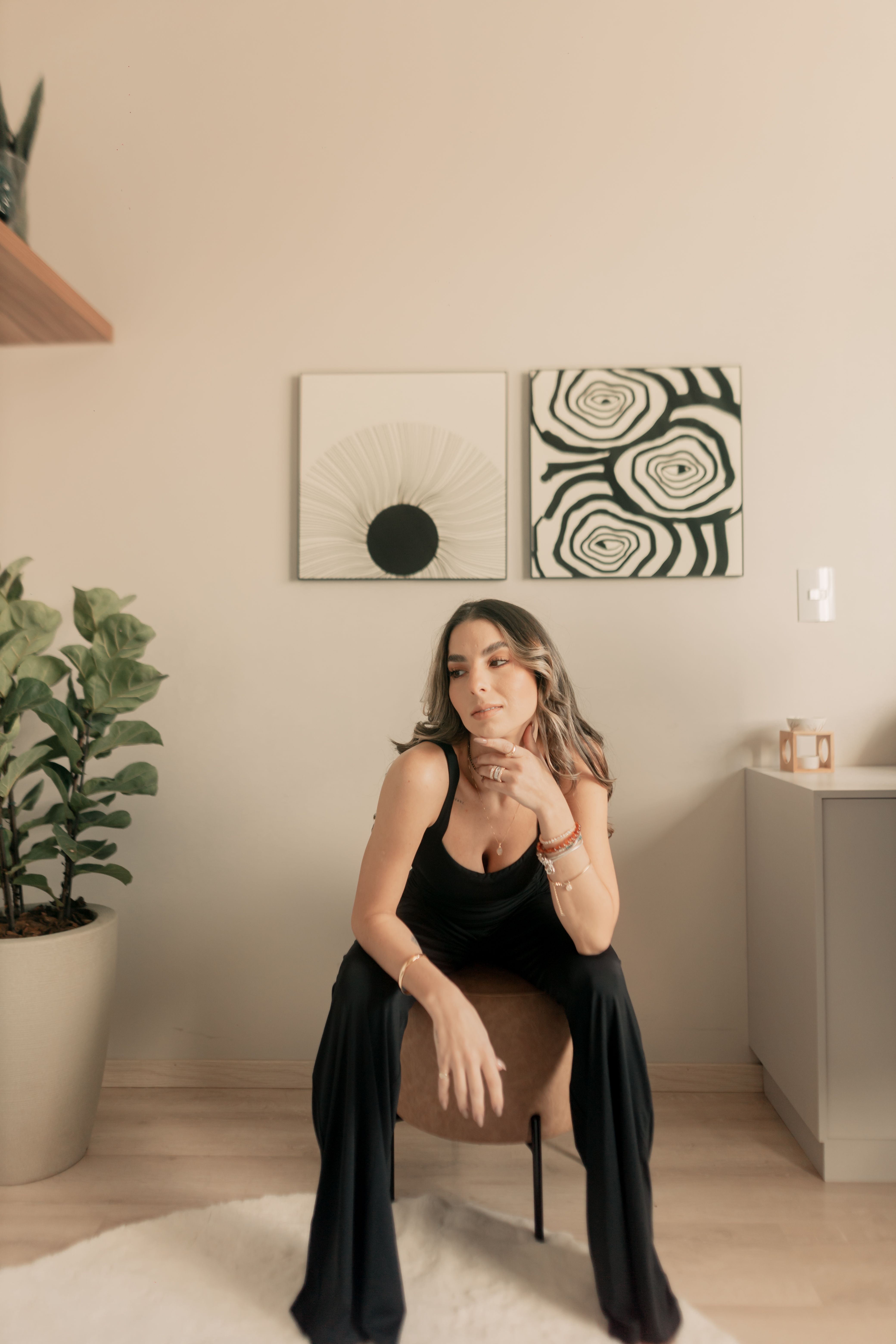 Stylish Woman Posing in Modern Indoor Setting · Free Stock Photo