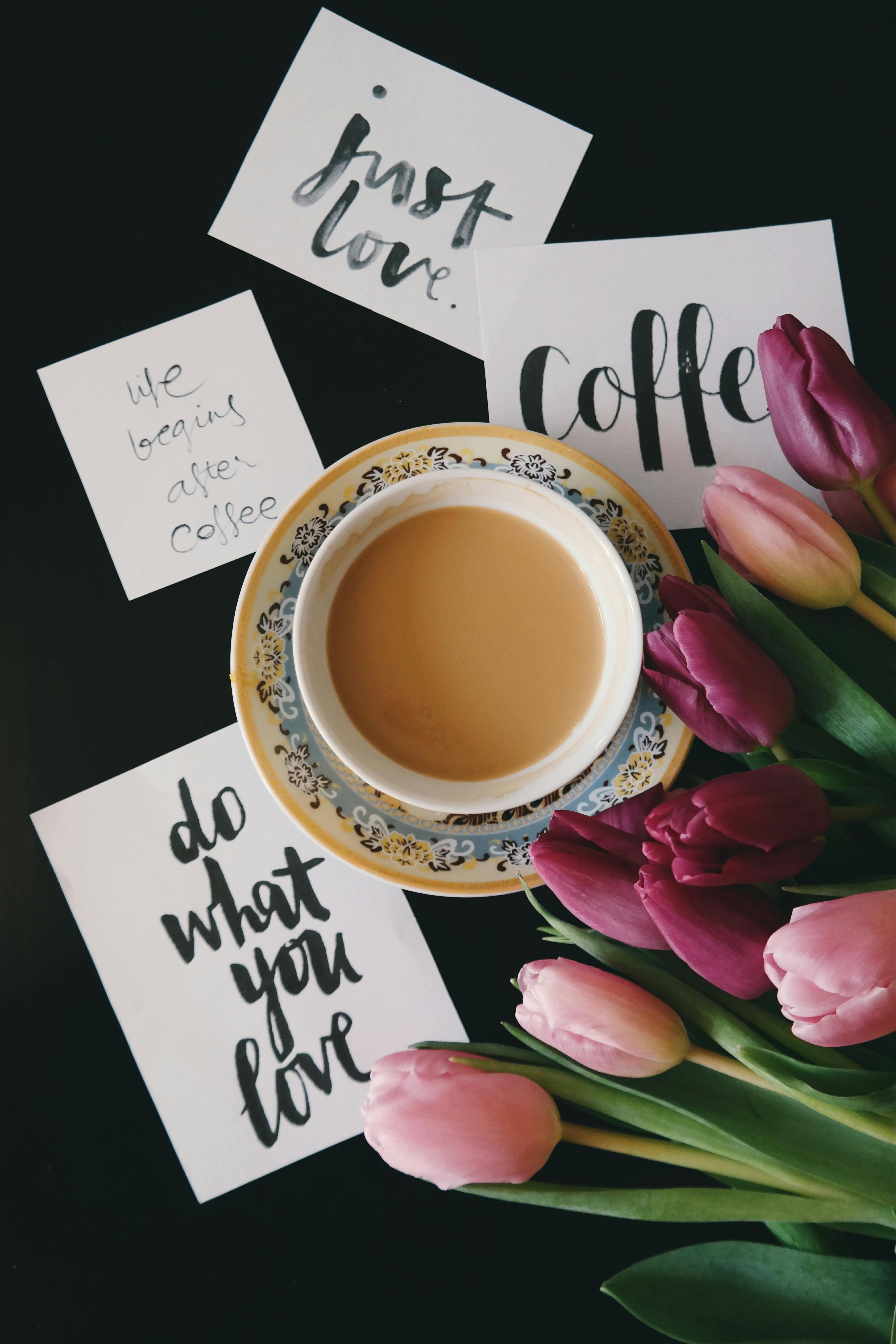 flat lay photography of cup filled with coffee