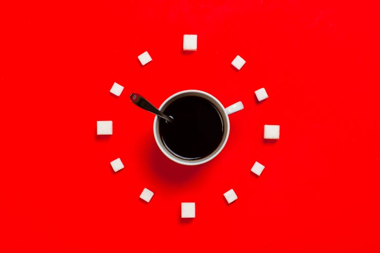 White Mug On Red Background