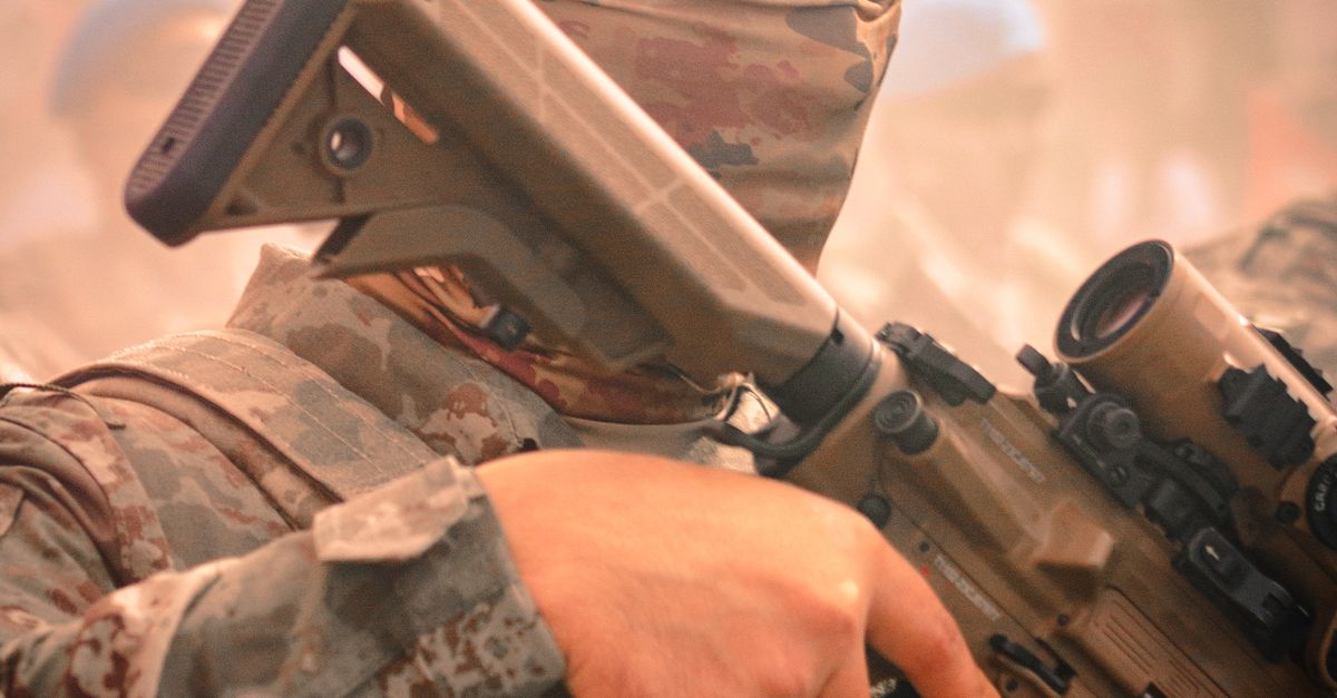 Tactical Rifle Crop Turkish Soldier in Tactical Gear Holding Rifle · Free Stock Photo