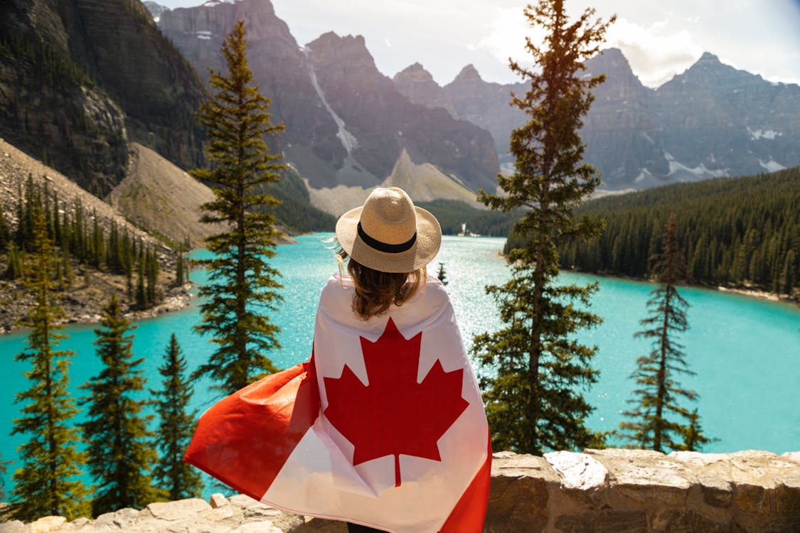 Woman Draped In A Flag Of Canada
