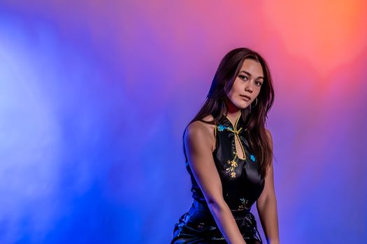 Artistic studio portrait with colorful lighting in Toronto.