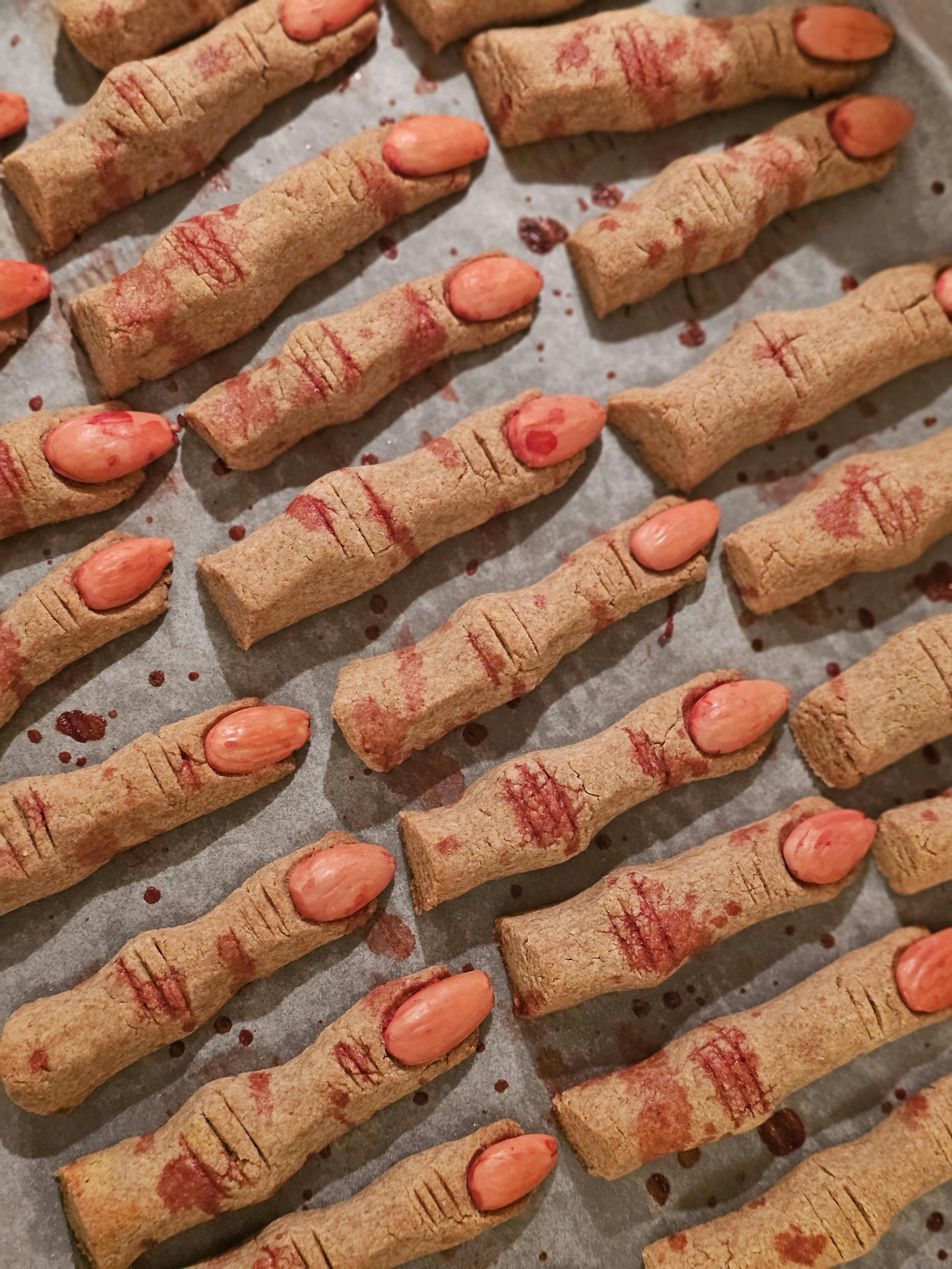Halloween-themed cookies shaped like fingers, perfect for spooky treats.