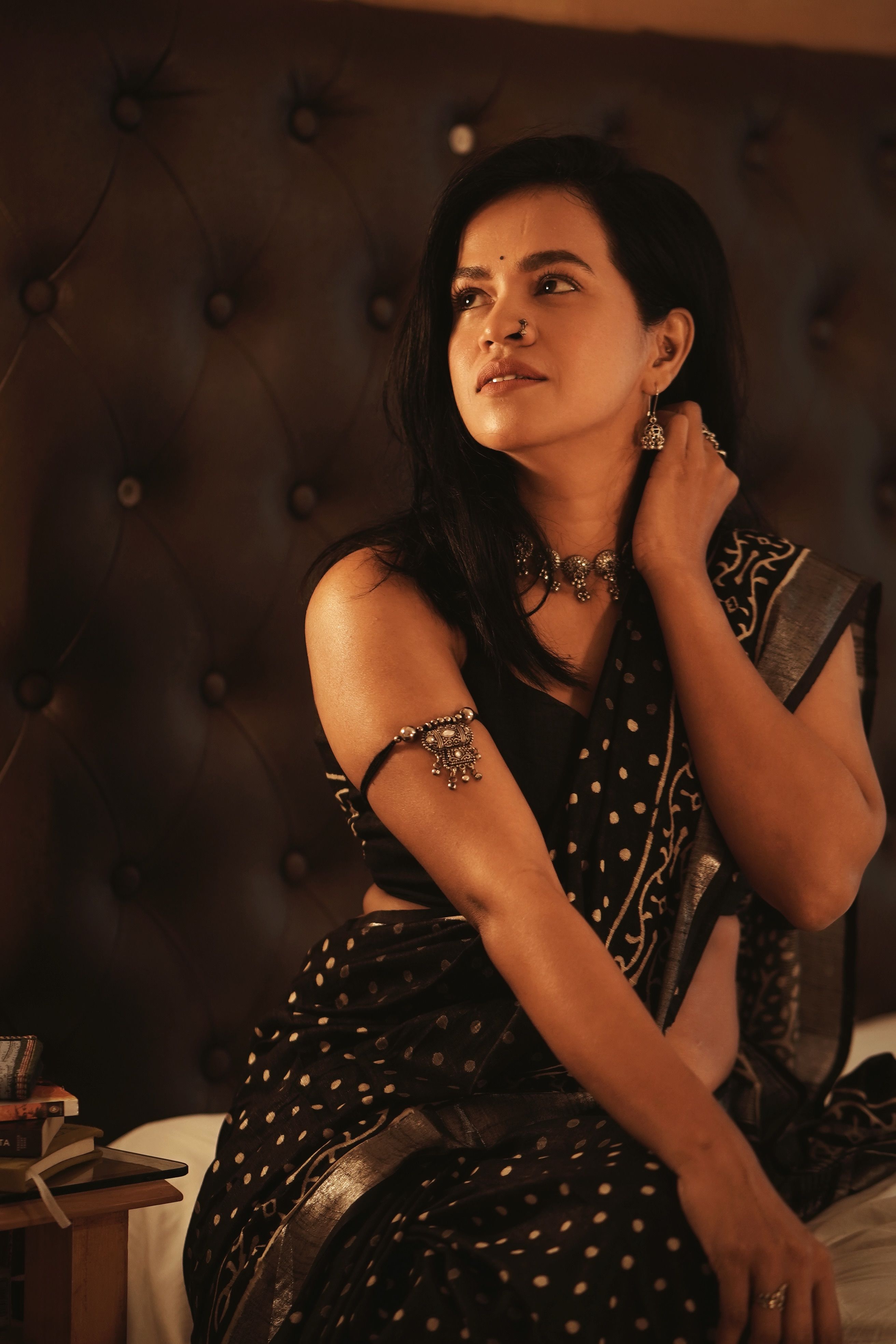 Elegant Woman in Traditional Attire Indoors · Free Stock Photo