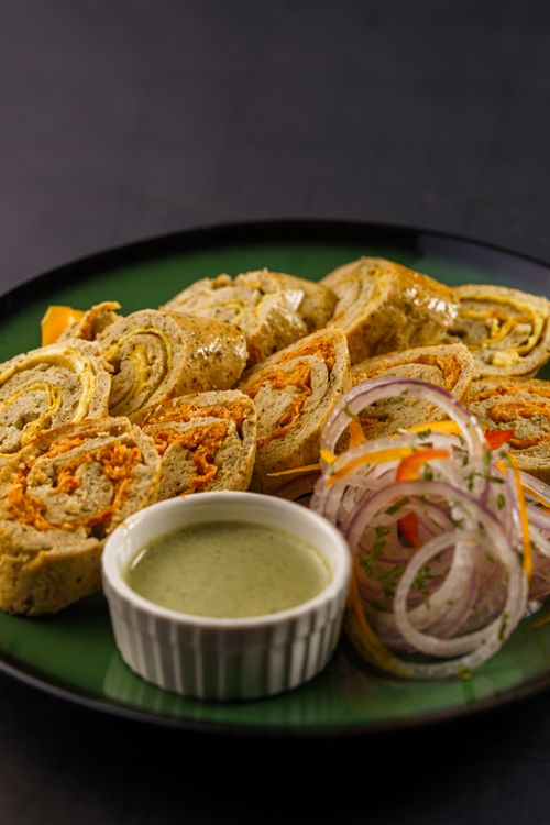 Free Savor these flavorful Indian Kathi Rolls with mint chutney and fresh onion salad, perfect for a quick bite. Stock Photo