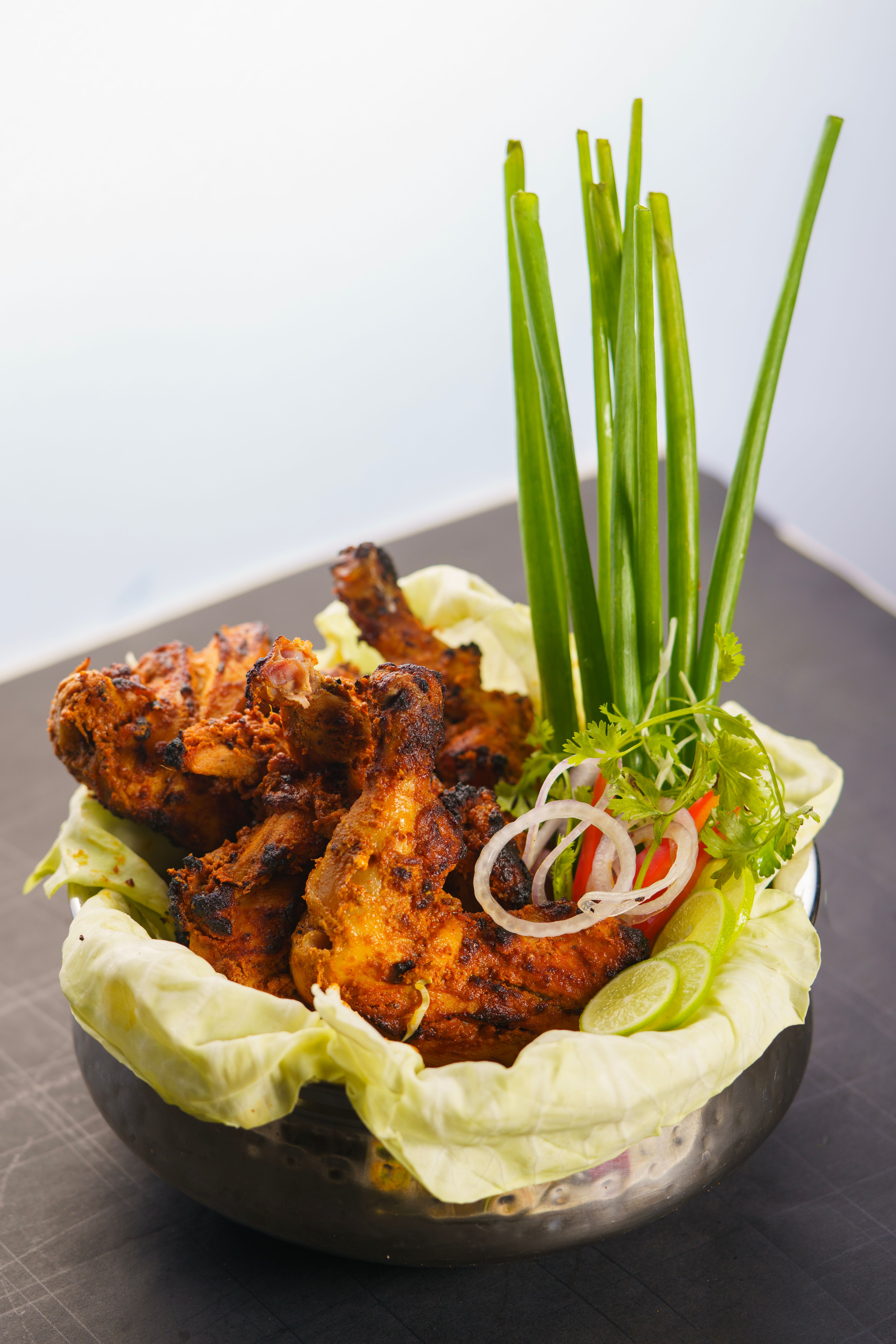 Savor the taste of grilled chicken with fresh vegetables and herbs.