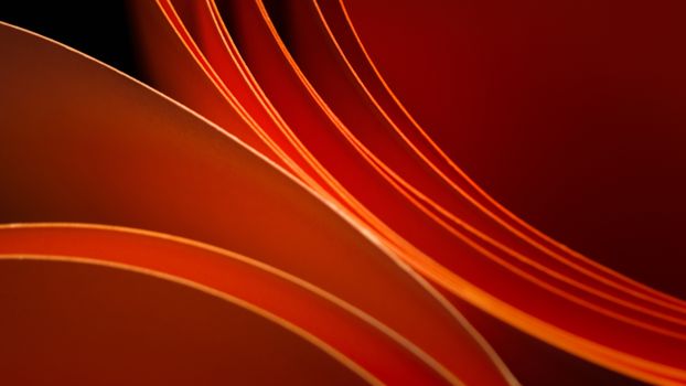 A striking abstract composition featuring vibrant orange curved paper with smooth textures.