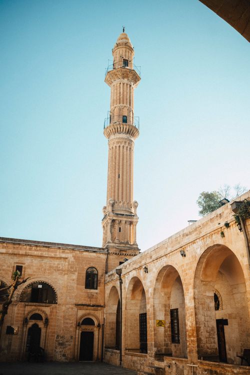 Free Beautiful view of a historic mosque minaret in Mardin, showcasing iconic architecture and cultural heritage. Stock Photo