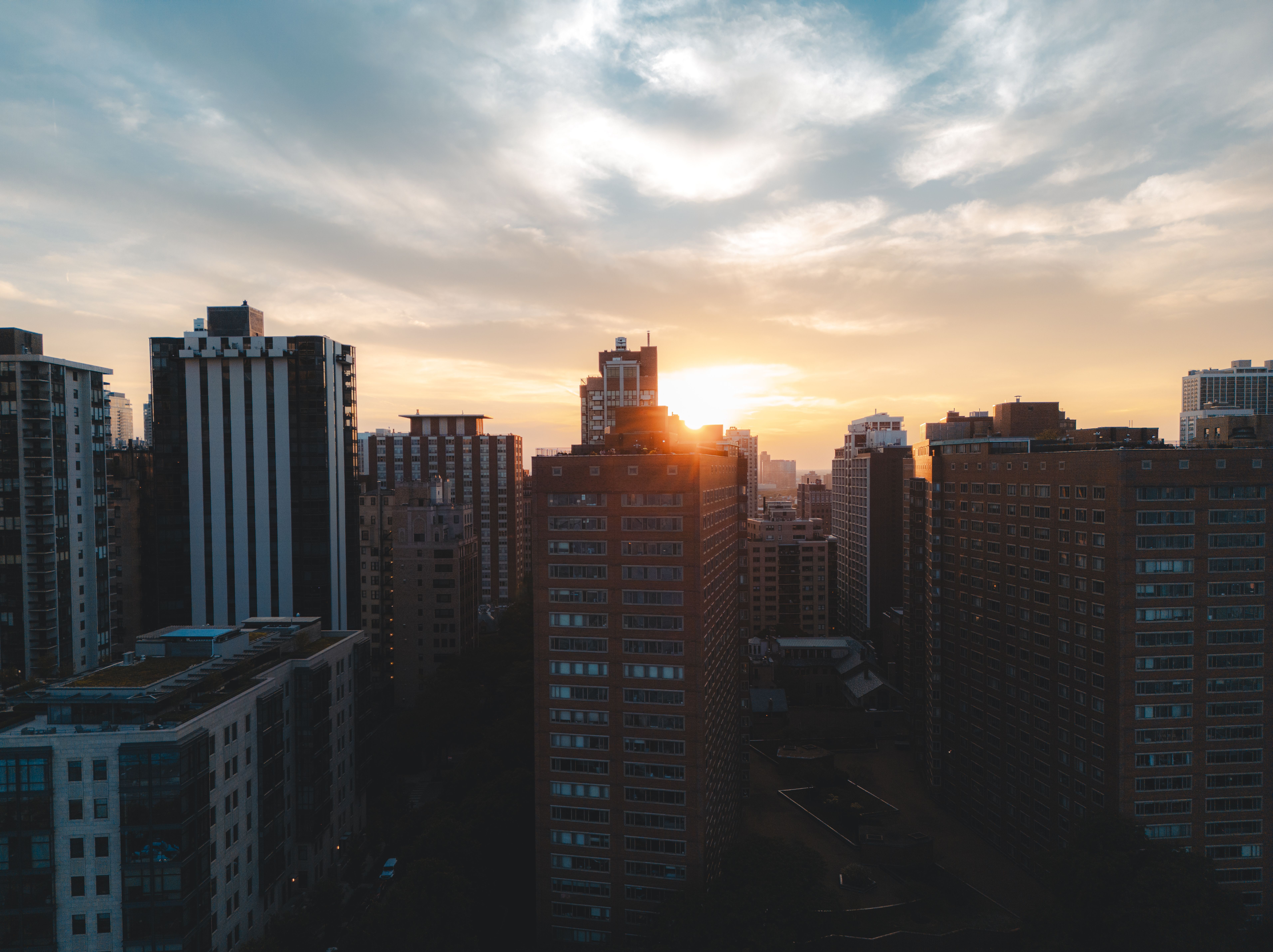 Urban Skyline at Sunset with Modern Buildings · Free Stock Photo