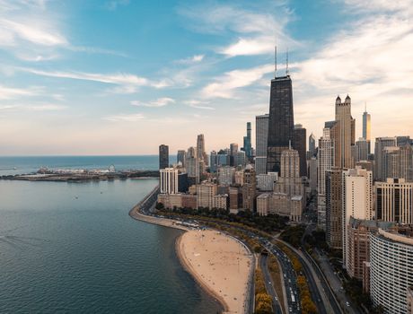 Stunning aerial view of Chicago skyline and beachfront along Lake Michigan.