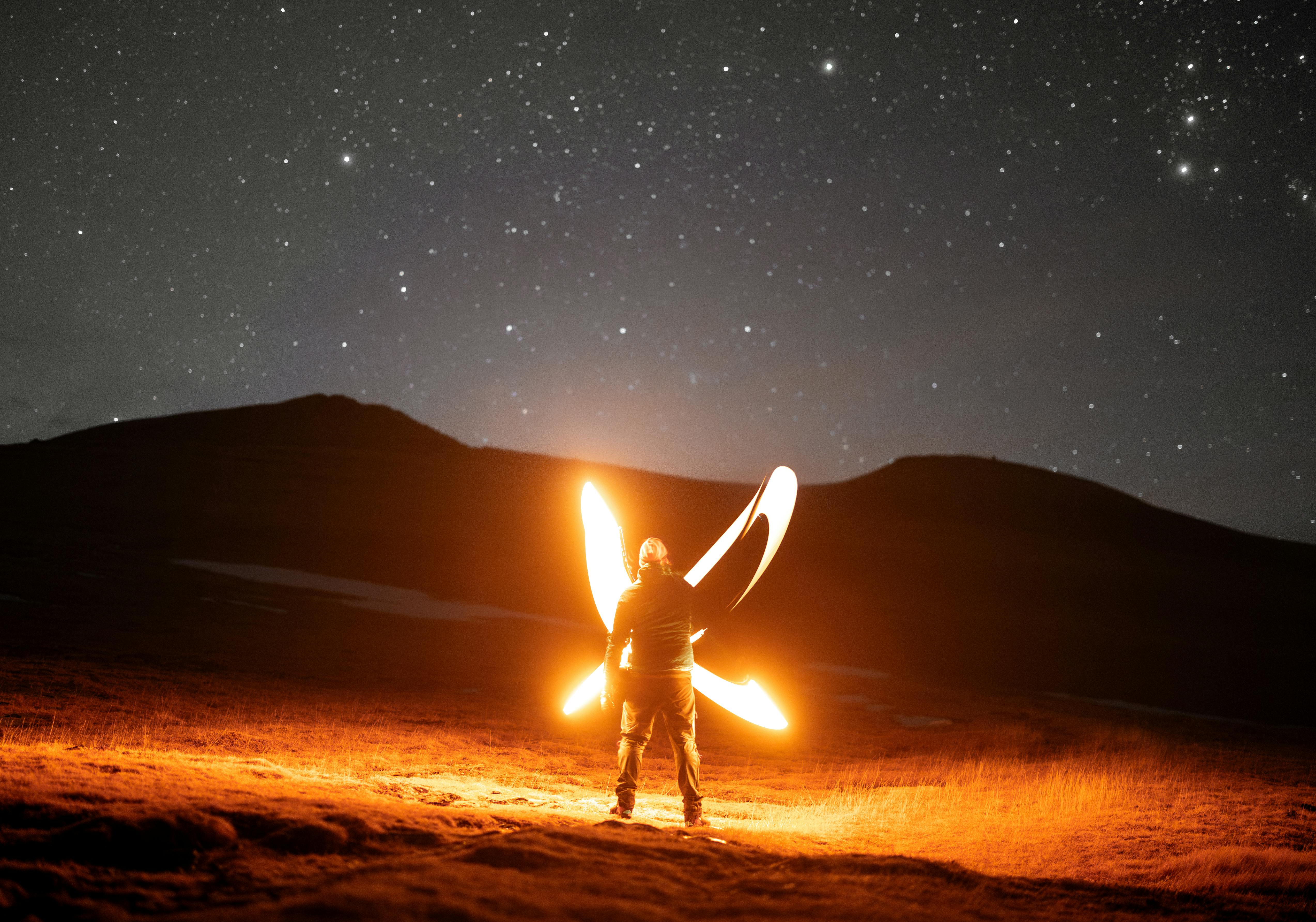 stargazer with lanterns in aragon spain