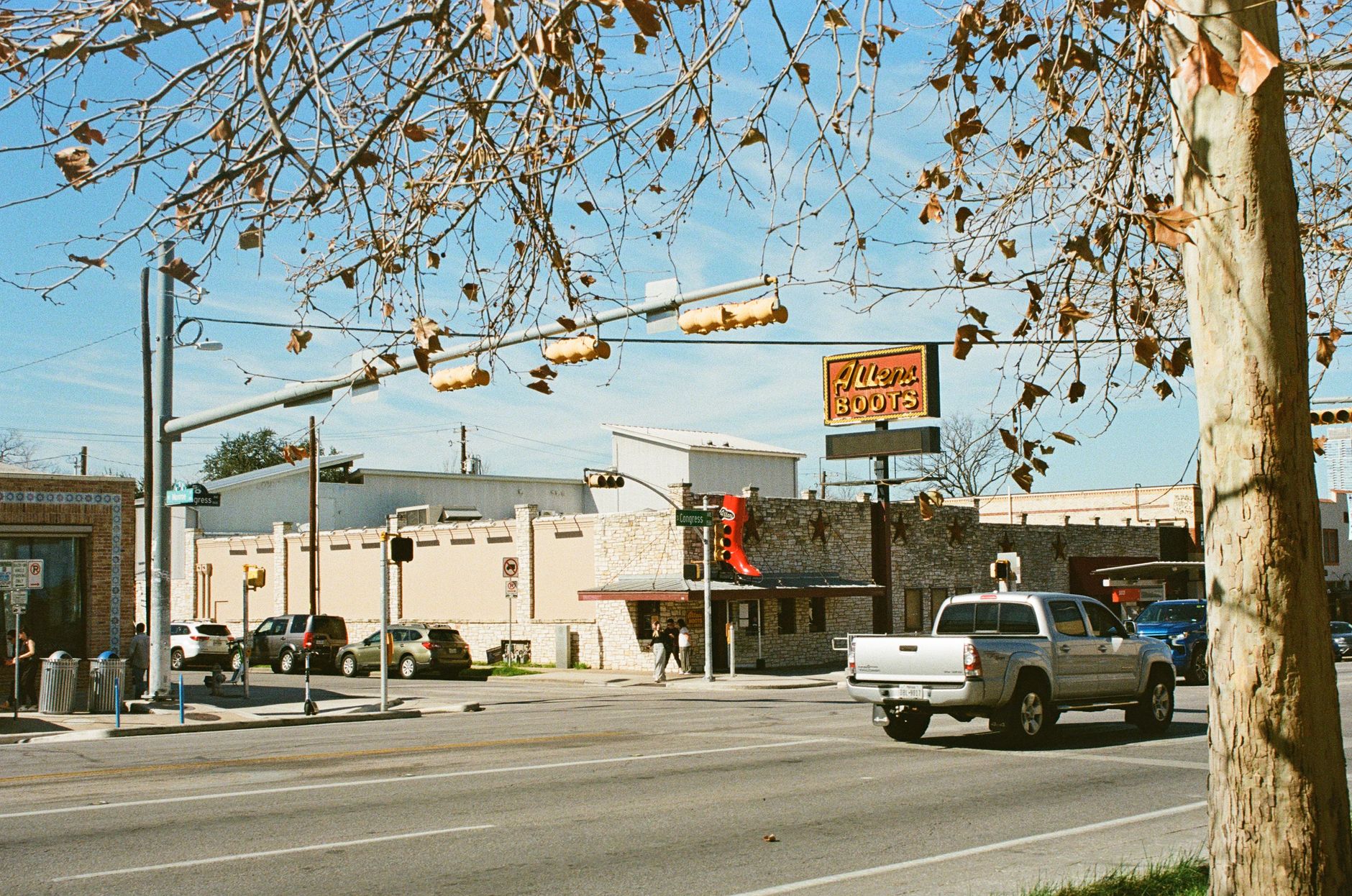 Street view of Allan's Boots store in downtown Austin, Texas during a fall day.