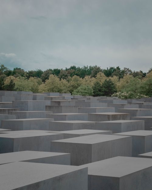 Free Explore the somber elegance of the Berlin Holocaust Memorial under a cloudy sky. Stock Photo