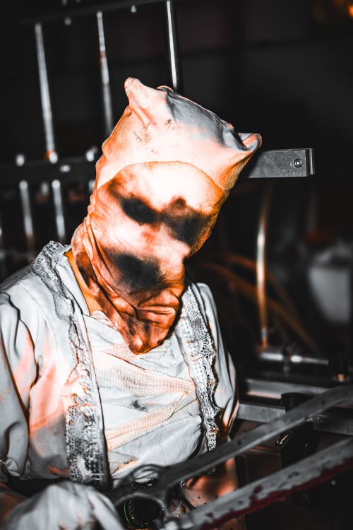 Distorted Masks Mysterious Figure in Distorted Mask and Costume · Free Stock Photo