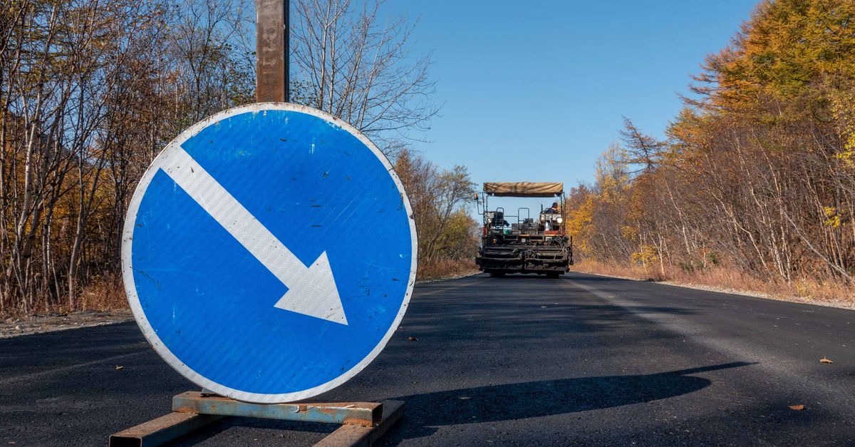 Redirection Sign Construction Road Construction with Directional Sign · Free Stock Photo