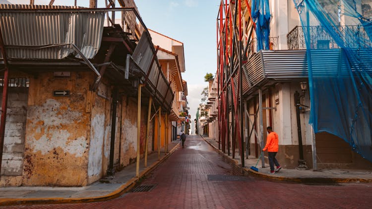 Person Cleaning Street