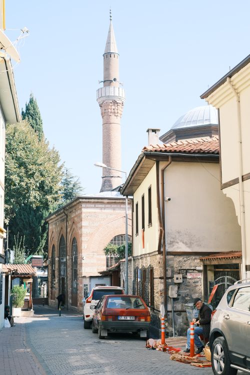 Free Charming street view in Bursa, Turkey featuring a historic mosque and old architecture. Stock Photo