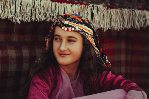 Free Portrait of a young woman in traditional Kurdish attire, Erbil, Iraq. Stock Photo
