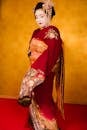 Woman Wearing Red And Gold Kimono