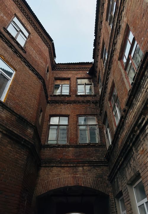 Free Vertical view of a historic brick building's facade in Ufa, Russia. Stock Photo