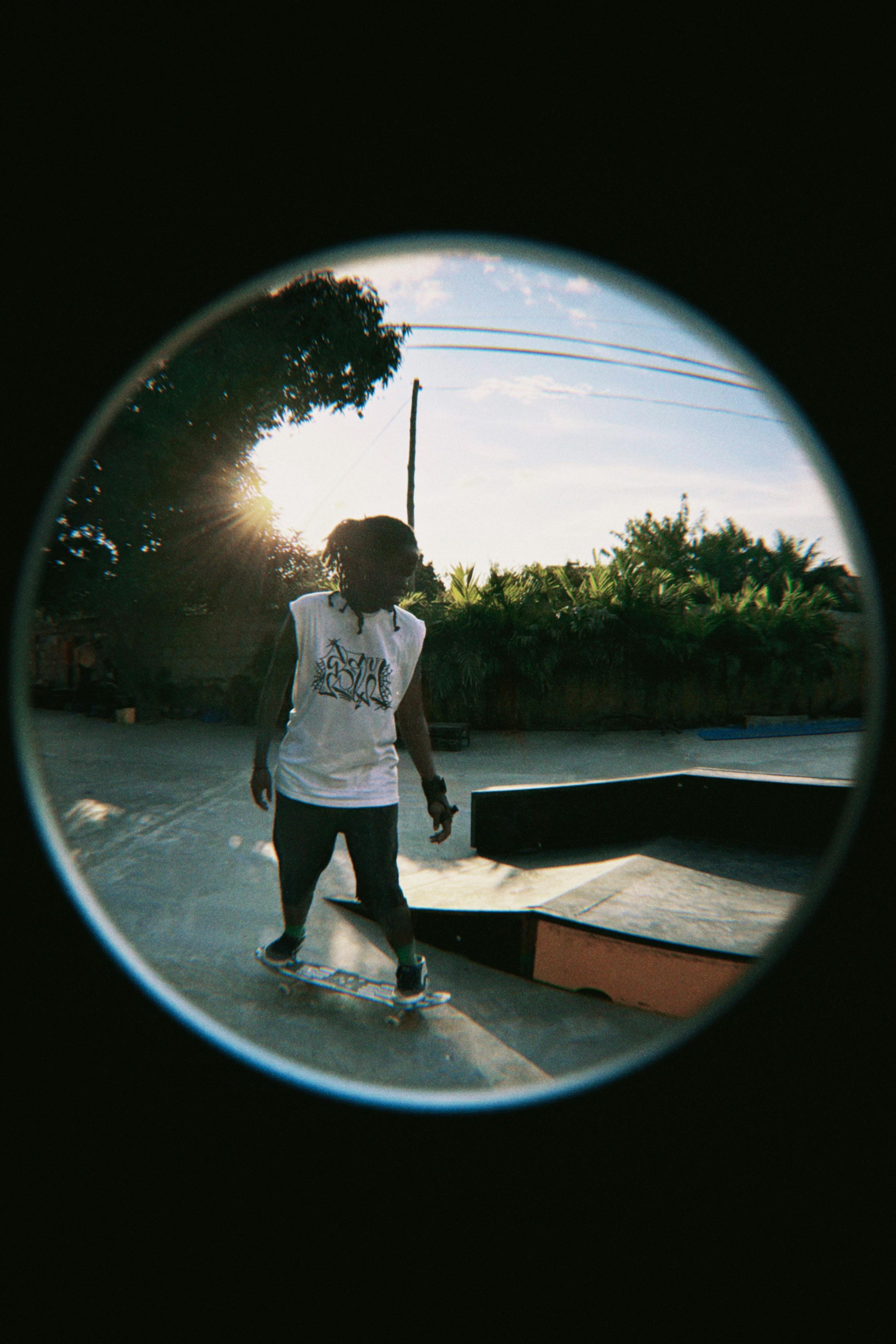 A young skateboarder performing tricks at a skate park in Accra, Ghana.