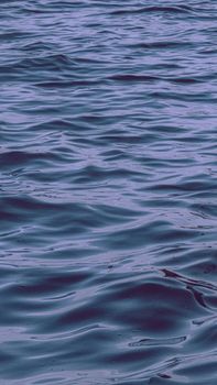 Captivating abstract view of tranquil ocean waves, showcasing a harmonious blend of blue tones.