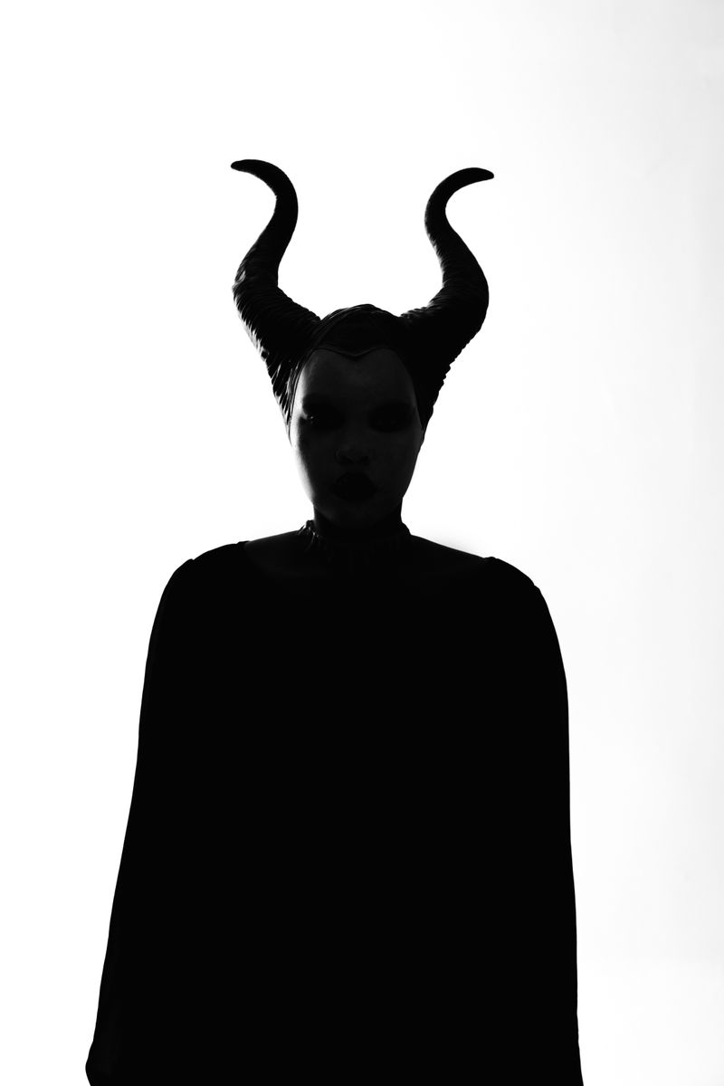 Silhouette of a person with horns creating a mysterious and eerie aura.