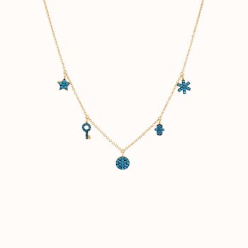 Elegant gold necklace with blue gem charms in star, key, and snowflake shapes.