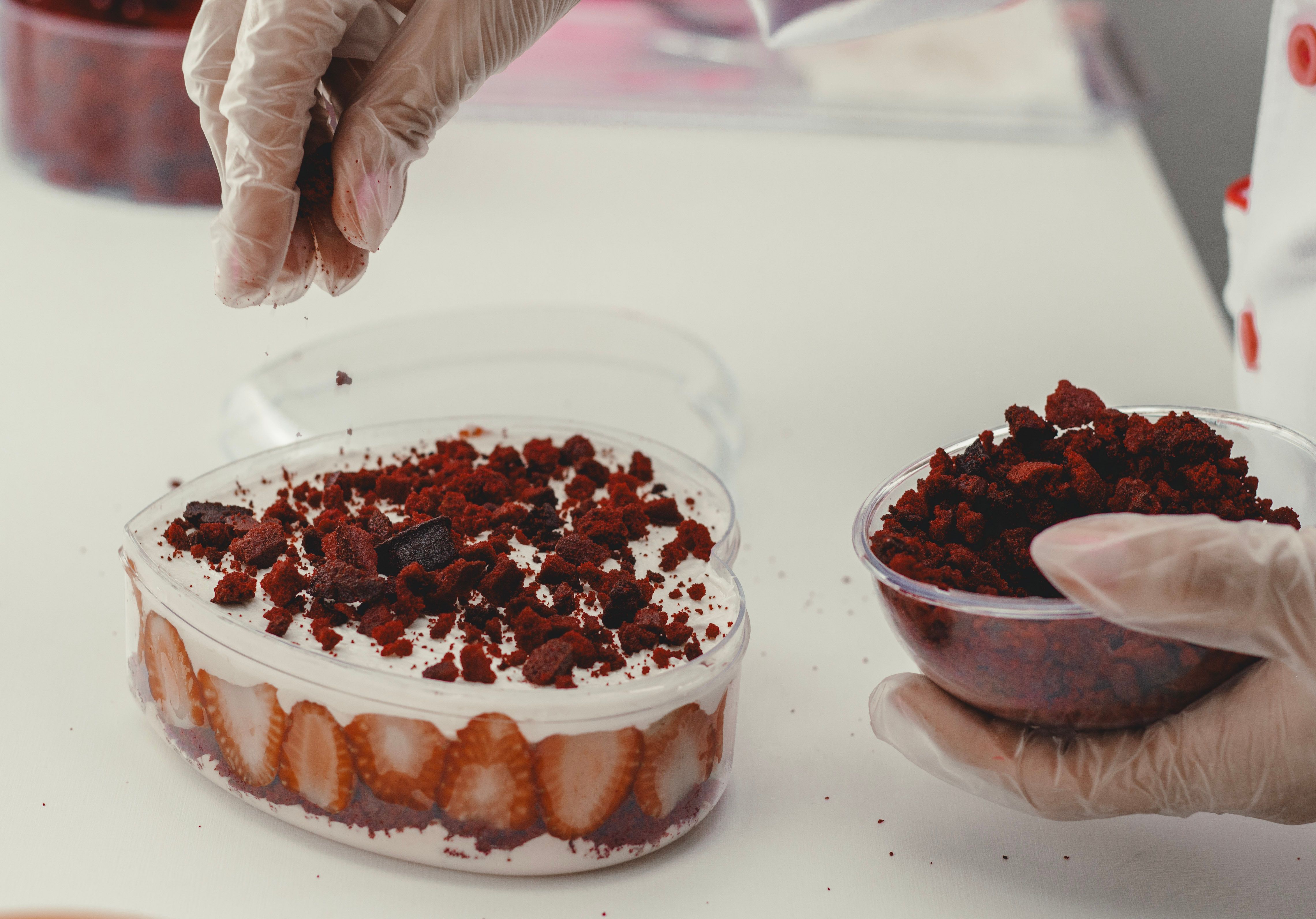 Close-up of crunchy strawberry topping coating homemade ice cream bars