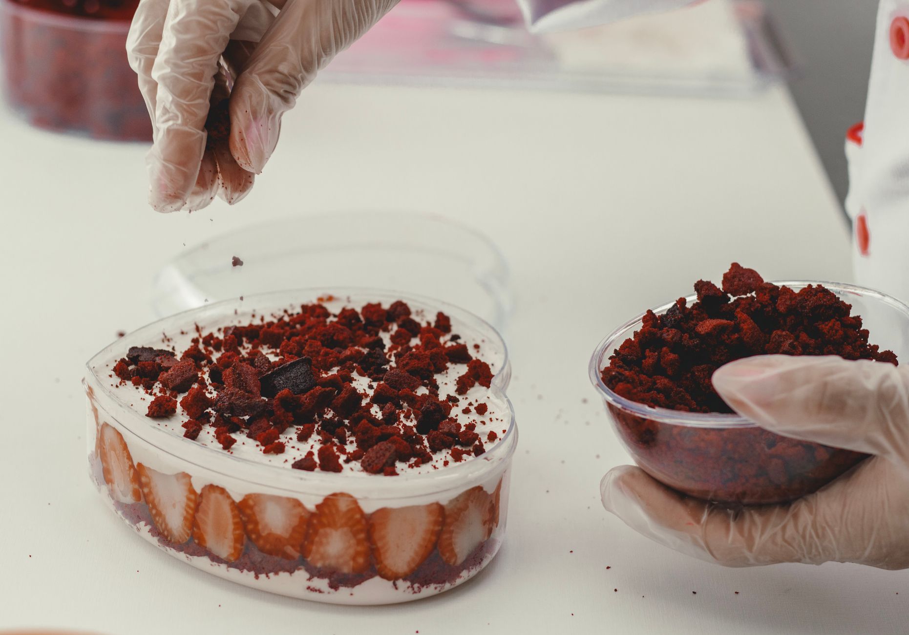 Close-up of crunchy strawberry topping coating homemade ice cream bars