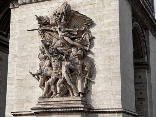 Free Intricate close-up of a historic sculpture on the Arc de Triomphe in Paris, France. Stock Photo
