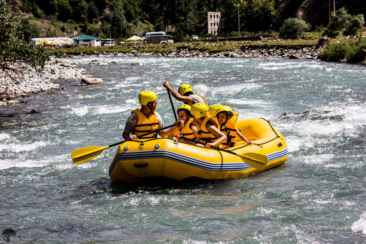 Group raft with paddlers
