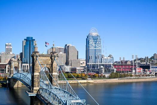 Beautiful view of Cincinnati skyline featuring the iconic Roebling Suspension Bridge.