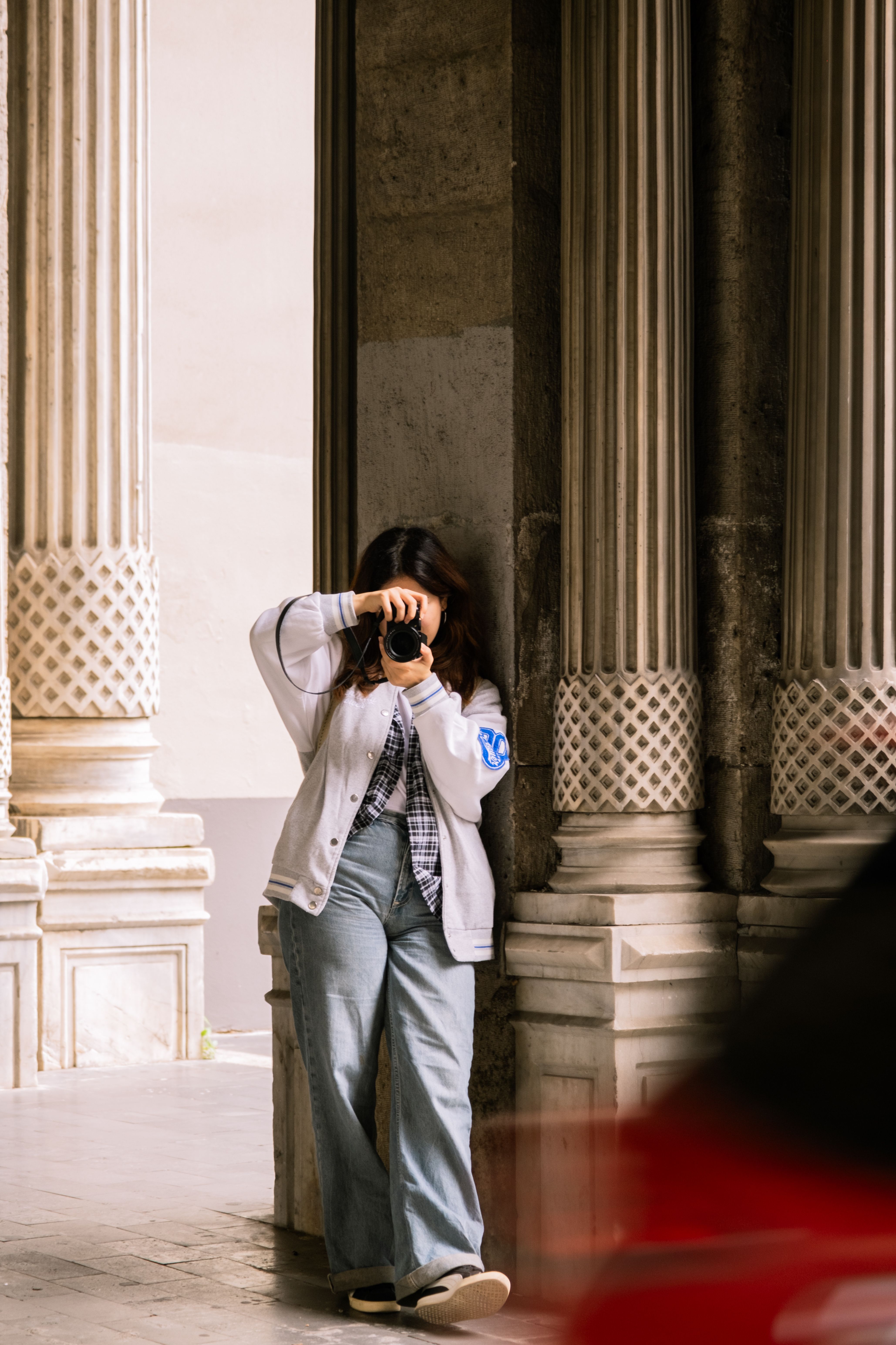 Photographer Capturing Urban Architecture Scene · Free Stock Photo